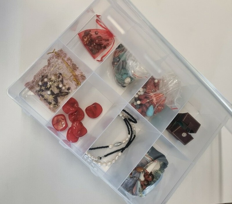 Sealed plastic box for storing jewellery