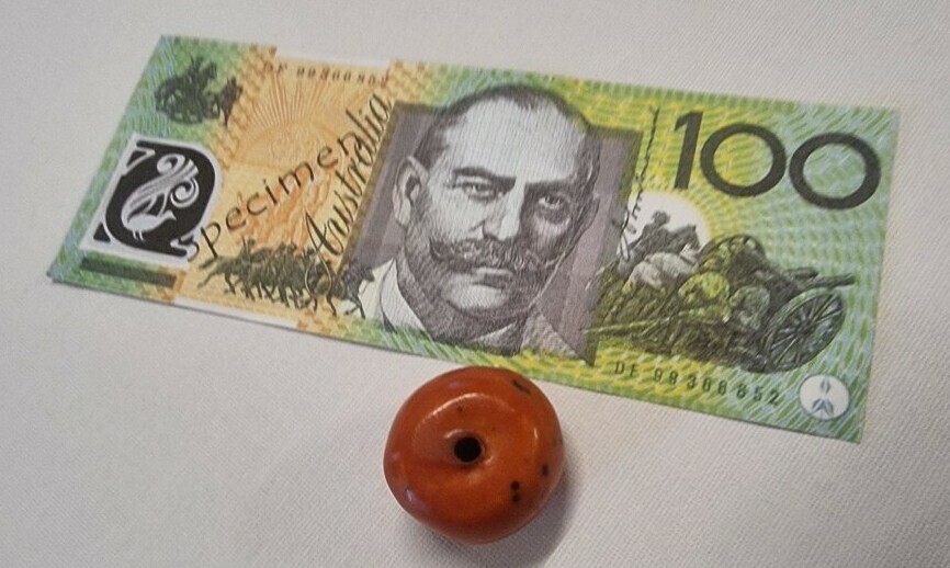 Specimen $100 Australian Money note and Amber Trade Bead